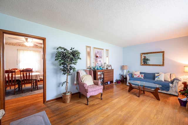 4312 Kemp Dr, Chattanooga, TN 37411 - living area featuring light wood-type flooring and a textured ceiling