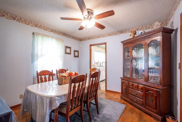 4312 Kemp Dr, Chattanooga, TN 37411 - dining area with a textured ceiling, ceiling fan, and wood finished floors