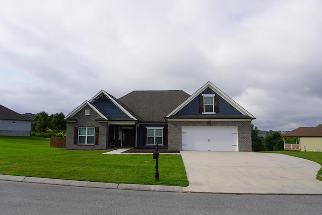 11015 High River Dr, Soddy Daisy, TN 37379 - craftsman-style house featuring a front lawn, driveway, brick siding, and a garage