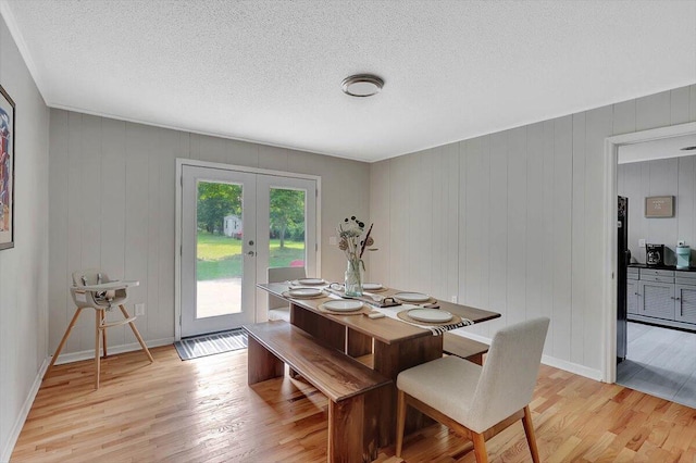 824 Graysville Rd, Chattanooga, TN 37421 - dining area with light wood finished floors, french doors, and a textured ceiling