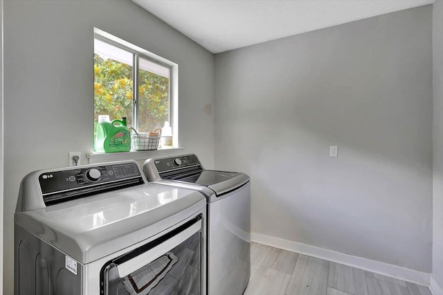 824 Graysville Rd, Chattanooga, TN 37421 - laundry area with washing machine and dryer and baseboards