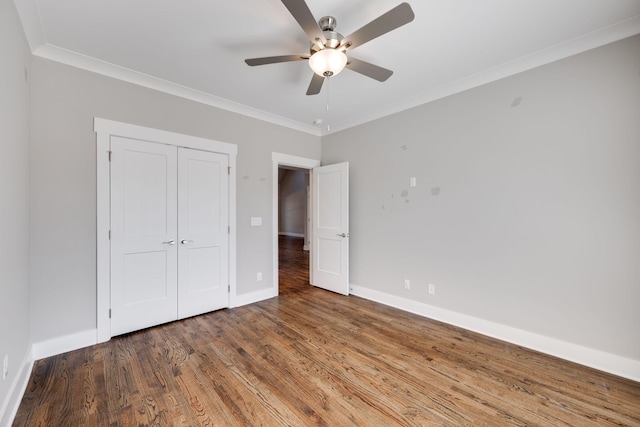 10619 Kavya Ln, Apison, TN 37302 - unfurnished bedroom with ornamental molding, wood finished floors, a closet, and ceiling fan