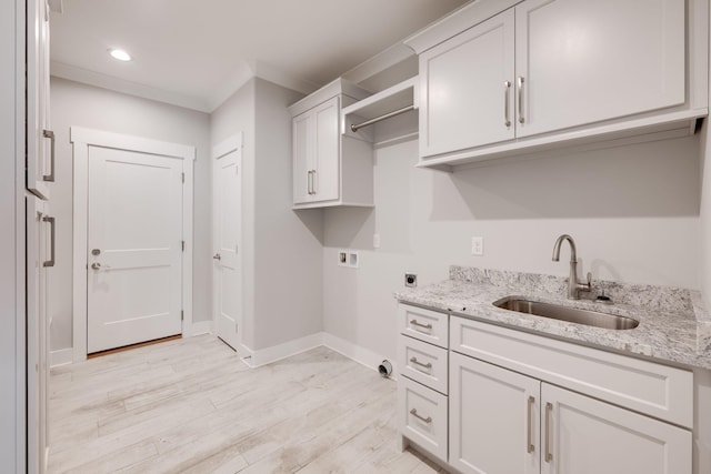 10619 Kavya Ln, Apison, TN 37302 - washroom with electric dryer hookup, hookup for a washing machine, light wood-style flooring, cabinet space, and recessed lighting
