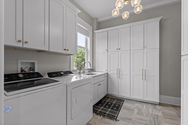 2109 E Brow Rd, Walden, TN 37377 - laundry area with washing machine and dryer, cabinet space, and a chandelier