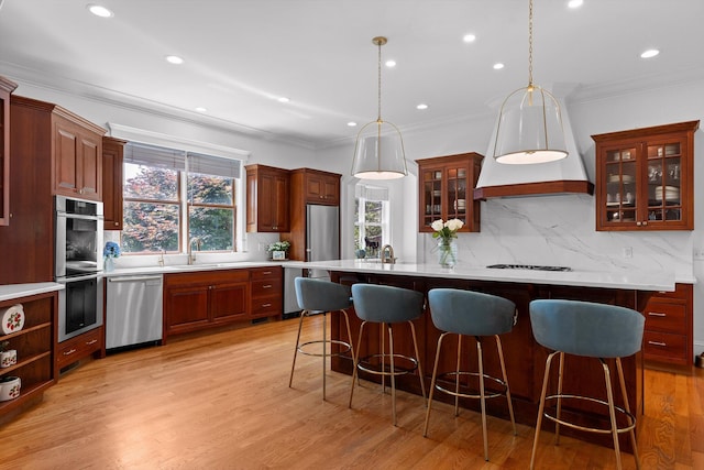 2109 E Brow Rd, Walden, TN 37377 - kitchen featuring appliances with stainless steel finishes, backsplash, light countertops, recessed lighting, and ornamental molding