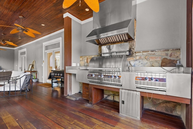 2109 E Brow Rd, Walden, TN 37377 - kitchen featuring wall chimney exhaust hood, a ceiling fan, ornamental molding, hardwood / wood-style floors, and stainless steel countertops