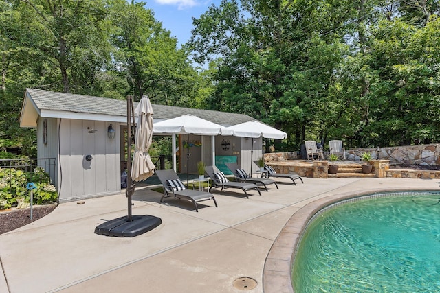 2109 E Brow Rd, Walden, TN 37377 - view of pool with a patio area, an outbuilding, and view of wooded area