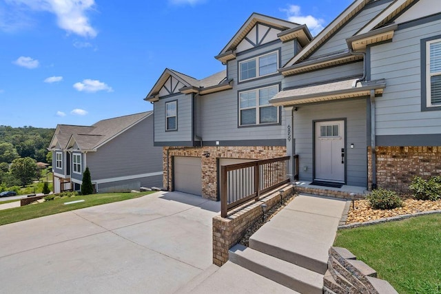 6859 Steep Hl, Ooltewah, TN 37363 - view of front of property with driveway, brick siding, and an attached garage