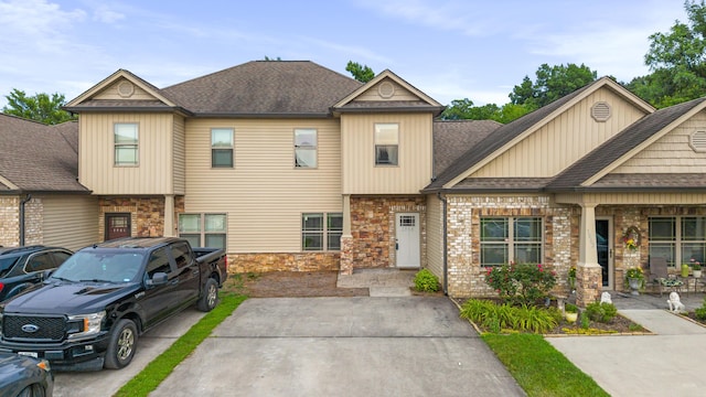 1864 Gate Tower Way NE, Cleveland, TN 37312 - townhome / multi-family property featuring roof with shingles and brick siding