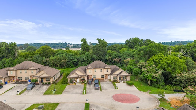 1864 Gate Tower Way NE, Cleveland, TN 37312 - aerial view of property and surrounding area featuring a forest