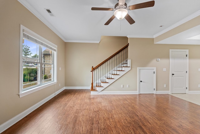 1864 Gate Tower Way NE, Cleveland, TN 37312 - unfurnished living room featuring wood finished floors, stairs, ornamental molding, and a ceiling fan
