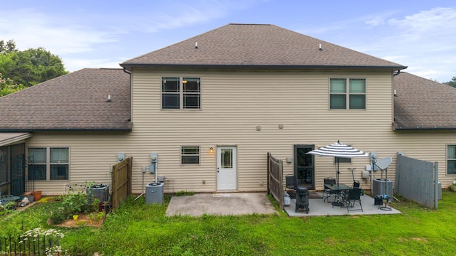 1864 Gate Tower Way NE, Cleveland, TN 37312 - back of house featuring a patio area and roof with shingles