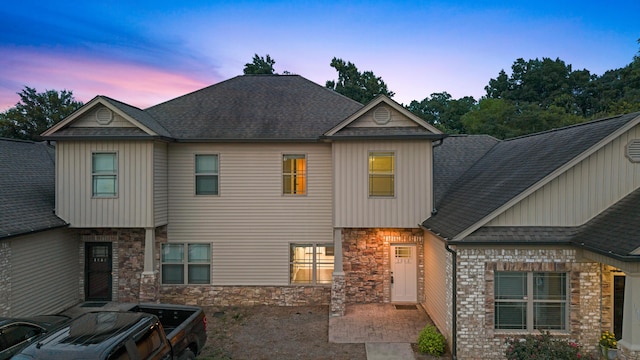 1864 Gate Tower Way NE, Cleveland, TN 37312 - view of front of house featuring stone siding, board and batten siding, and a shingled roof