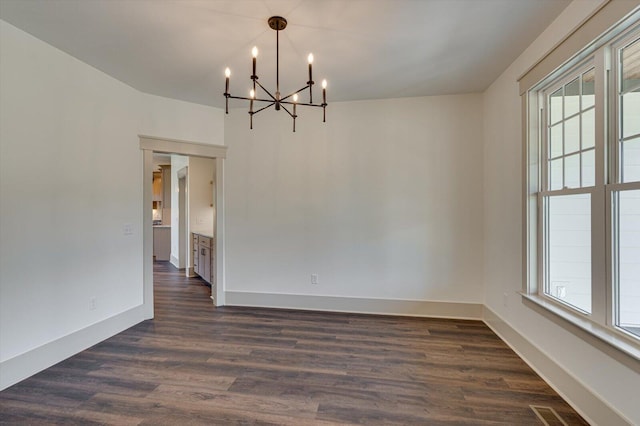 7104 Paxton Cir, Hixson, TN 37343 - spare room with a chandelier, dark wood-style flooring, and plenty of natural light