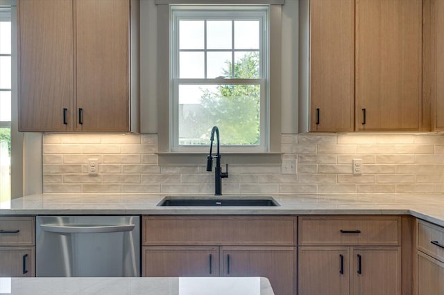 7104 Paxton Cir, Hixson, TN 37343 - kitchen with dishwasher, decorative backsplash, and light stone countertops