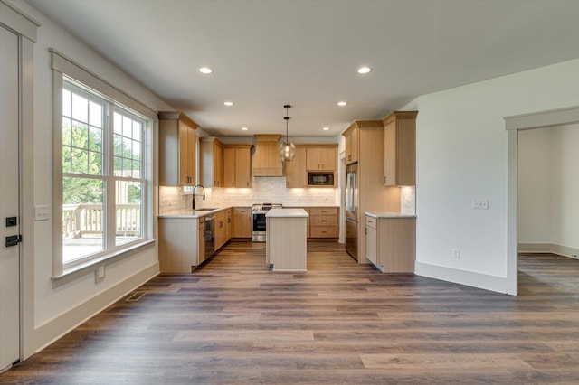 7104 Paxton Cir, Hixson, TN 37343 - kitchen with appliances with stainless steel finishes, a center island, light countertops, dark wood-style floors, and recessed lighting