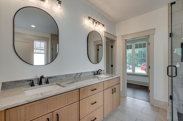 7104 Paxton Cir, Hixson, TN 37343 - full bath featuring double vanity, a shower stall, and tile patterned flooring