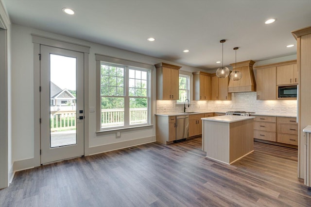 7104 Paxton Cir, Hixson, TN 37343 - kitchen featuring stainless steel dishwasher, black microwave, light brown cabinetry, premium range hood, and recessed lighting