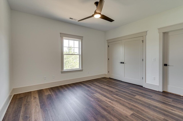 7104 Paxton Cir, Hixson, TN 37343 - unfurnished bedroom featuring dark wood finished floors and a ceiling fan