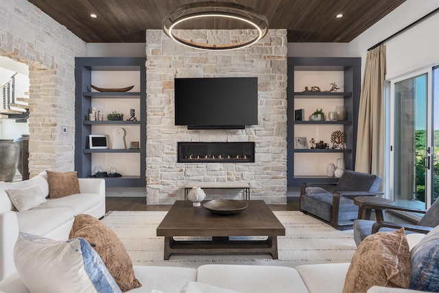 1034 Montlake Rd, Soddy Daisy, TN 37379 - living area featuring wood finished floors, wood ceiling, built in shelves, recessed lighting, and a fireplace