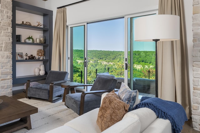 1034 Montlake Rd, Soddy Daisy, TN 37379 - living room featuring built in features and a view of trees