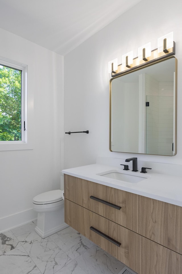 1034 Montlake Rd, Soddy Daisy, TN 37379 - bathroom with vanity, marble finish flooring, and a shower with door
