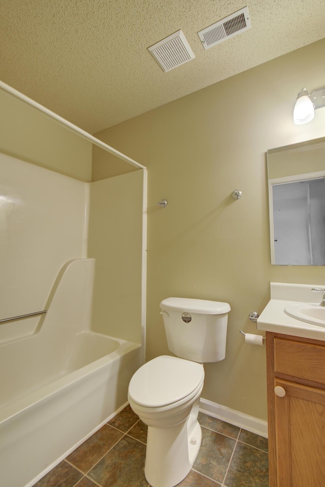 9028 Warbler Ln, Chattanooga, TN 37421 - bathroom featuring vanity, shower / bathtub combination, a textured ceiling, and tile patterned floors