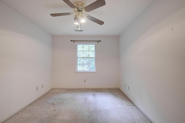 9028 Warbler Ln, Chattanooga, TN 37421 - unfurnished room featuring light colored carpet, a textured ceiling, and a ceiling fan