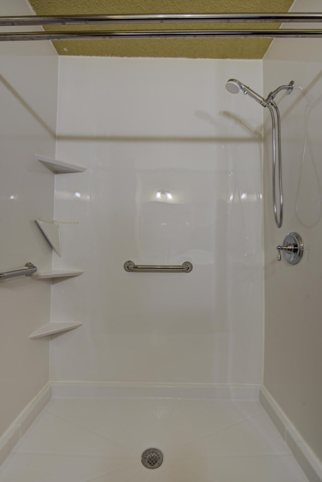 9028 Warbler Ln, Chattanooga, TN 37421 - bathroom with a shower and tile patterned floors