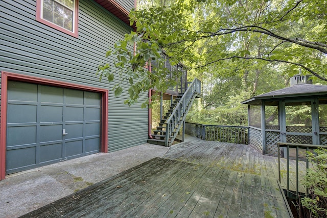 9028 Warbler Ln, Chattanooga, TN 37421 - wooden deck with stairs, a garage, and a gazebo
