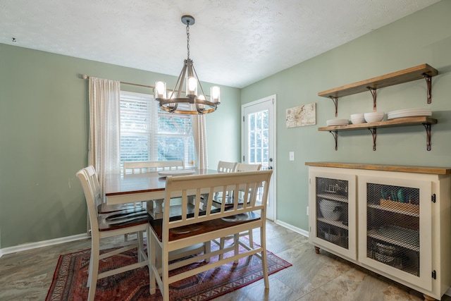 171 Gentry Rd, Ringgold, GA 30736 - dining area with a chandelier and a textured ceiling