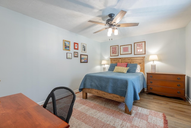171 Gentry Rd, Ringgold, GA 30736 - bedroom with wood finished floors and a ceiling fan