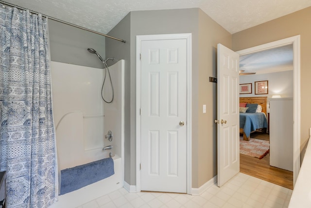 171 Gentry Rd, Ringgold, GA 30736 - bathroom with shower / bath combo, ensuite bath, and a textured ceiling