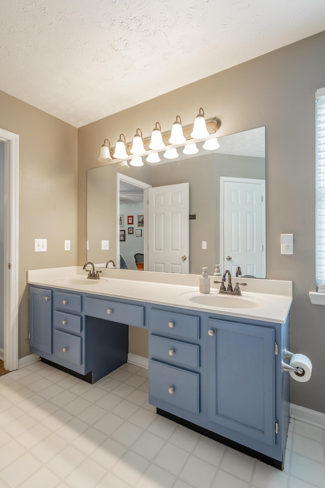 171 Gentry Rd, Ringgold, GA 30736 - full bath featuring double vanity and a textured ceiling