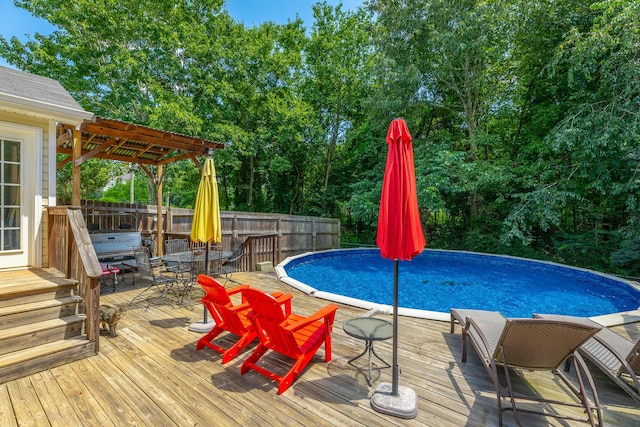 171 Gentry Rd, Ringgold, GA 30736 - swimming pool with a deck, outdoor dining space, and a fenced backyard