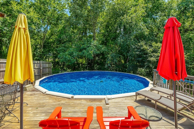 171 Gentry Rd, Ringgold, GA 30736 - view of swimming pool featuring a wooden deck and view of wooded area