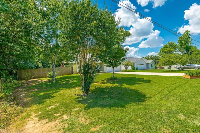171 Gentry Rd, Ringgold, GA 30736 - view of yard with concrete driveway and a garage