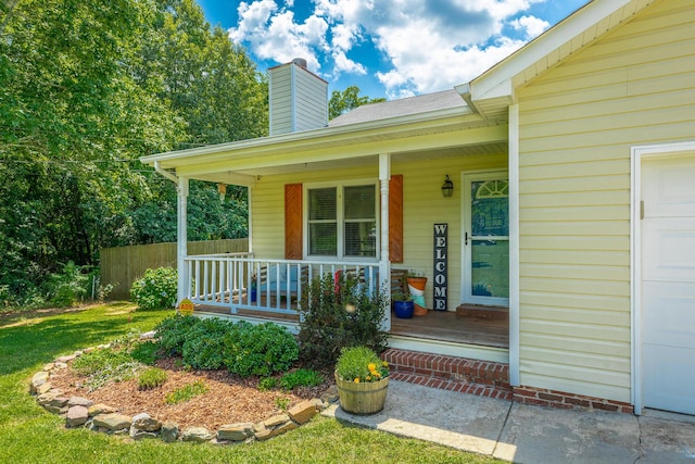 171 Gentry Rd, Ringgold, GA 30736 - doorway to property with covered porch and a chimney