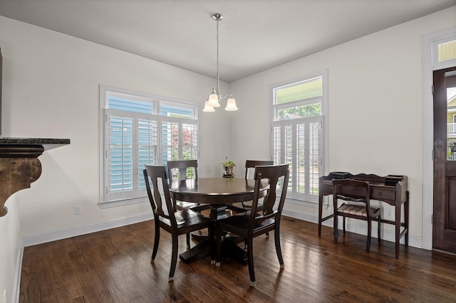 509 E 16th St, Chattanooga, TN 37408 - dining space featuring dark wood-style floors and a chandelier