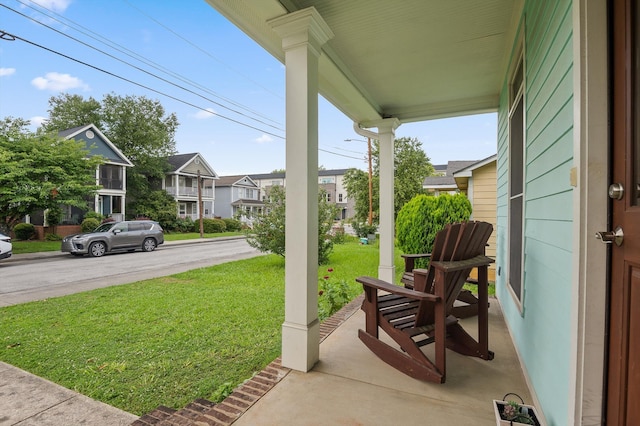 509 E 16th St, Chattanooga, TN 37408 - covered porch with a lawn and a residential view