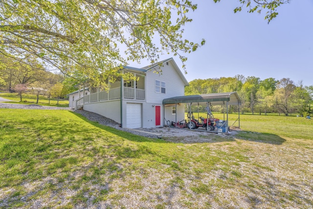 4976 Stewart Rd, Tunnel Hill, GA 30755 - back of property featuring a yard and a garage