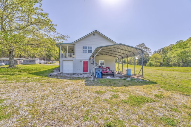4976 Stewart Rd, Tunnel Hill, GA 30755 - rear view of property featuring a yard, a garage, and a detached carport