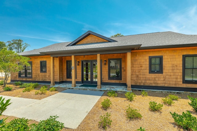 8 Heather Ln, Rising Fawn, GA 30738 - view of front of house featuring french doors, roof with shingles, and a porch