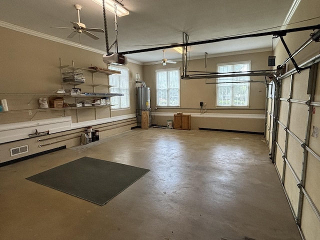 6419 Camdendown Ln, Hixson, TN 37343 - garage with a garage door opener, ceiling fan, and gas water heater