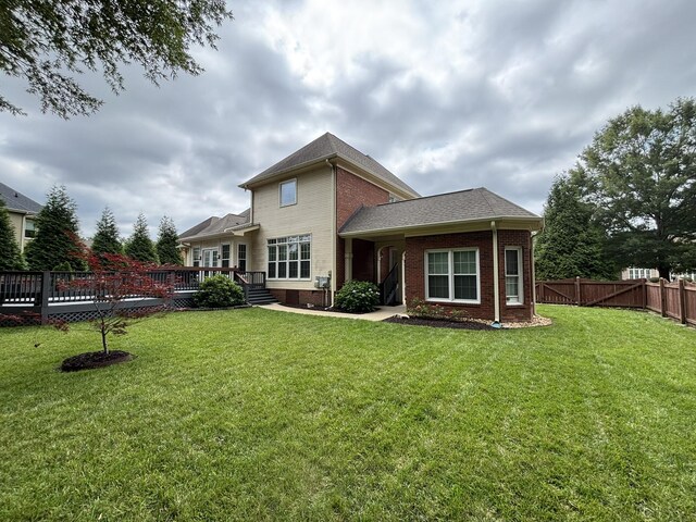 6419 Camdendown Ln, Hixson, TN 37343 - back of house featuring brick siding, a deck, and a shingled roof