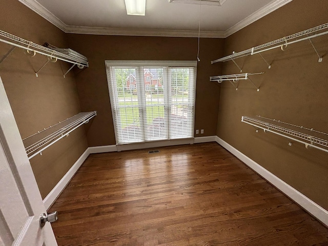 6419 Camdendown Ln, Hixson, TN 37343 - walk in closet featuring wood finished floors and attic access