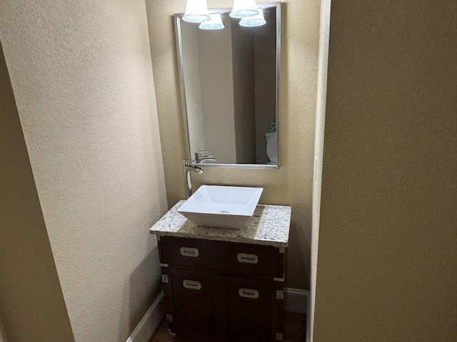 6419 Camdendown Ln, Hixson, TN 37343 - bathroom featuring vanity and a textured wall