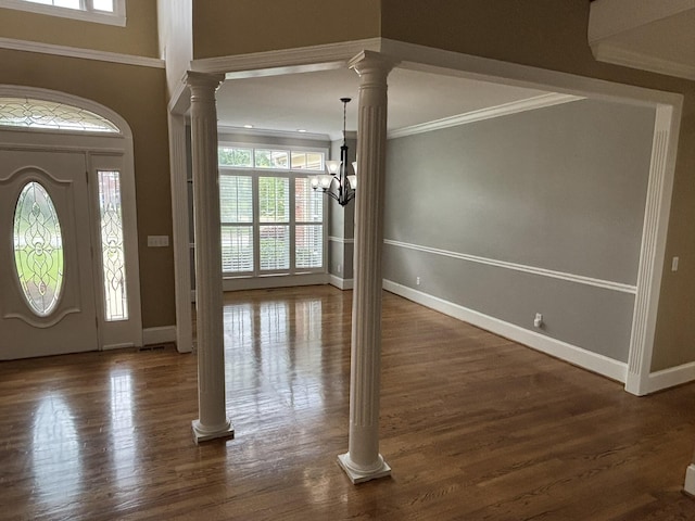 6419 Camdendown Ln, Hixson, TN 37343 - foyer entrance with healthy amount of natural light, decorative columns, a chandelier, and crown molding