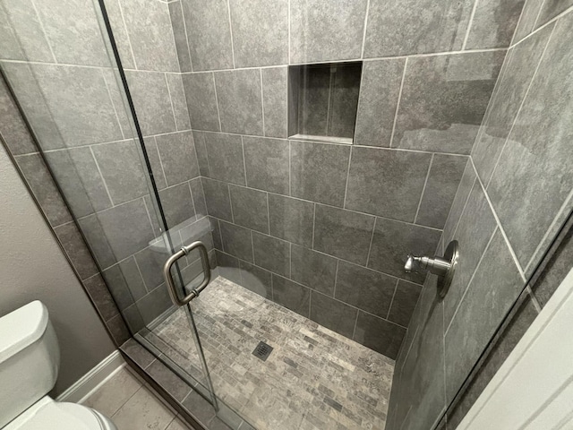 6419 Camdendown Ln, Hixson, TN 37343 - full bathroom featuring a shower stall and toilet