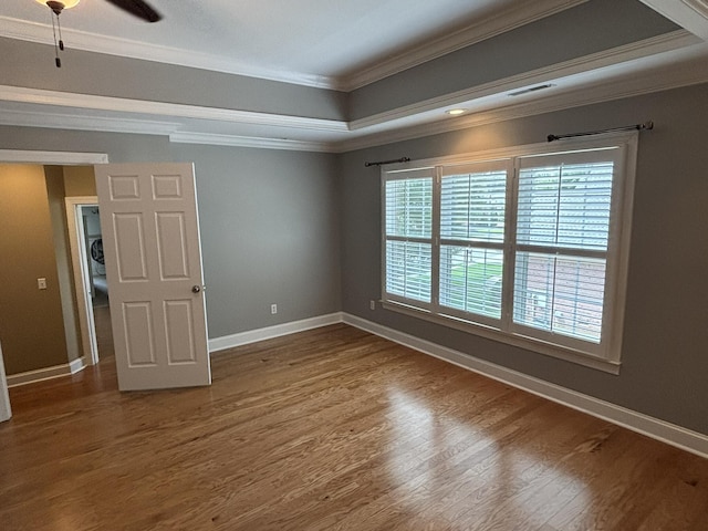 6419 Camdendown Ln, Hixson, TN 37343 - empty room featuring crown molding, wood finished floors, and a ceiling fan